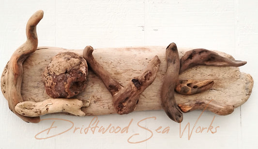 Add a touch of natural beauty to your home decor with our handmade LOVE sign. Crafted from natural wood driftwood, each piece is unique and brings a touch of rustic charm. Perfect for displaying in any room, this wall art is a beautiful reminder to spread love and positivity.