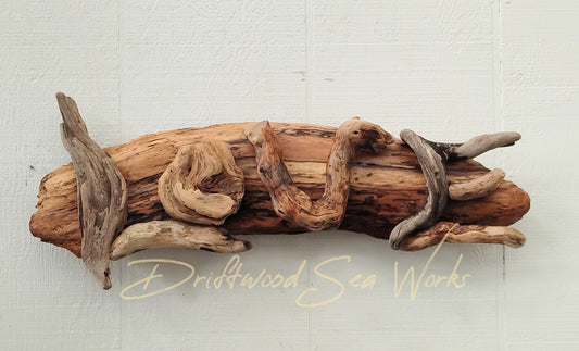 This handmade natural driftwood art love wall hanging sign is the perfect fifth anniversary, Valentine's Day or wedding gift.
Show your love in a unique way....Give a hand made symbol of your love.
This sign can be hung anywhere! Inside, outside, in the garden, on a porch, on a tree nail or hook.
Give it as a gift, or keep it for yourself.