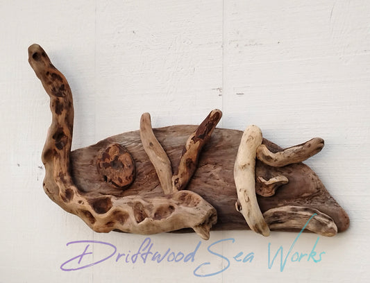 Add a touch of rustic charm to your home decor with our LOVE Sign Driftwood Wall Art. Made from natural driftwood, each piece is unique and adds a cozy, natural feel to any room. Perfect for weddings, anniversaries, or as a thoughtful gift to show someone you how much you care.