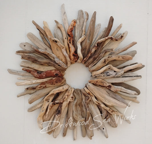 Expertly crafted with natural Oregon driftwood sticks, this large 28 x 26 inch driftwood wreath adds a touch of rustic charm to any space. Embrace the unique and organic beauty of this handmade piece. Perfect for year-round use, it's the perfect addition to your home decor.