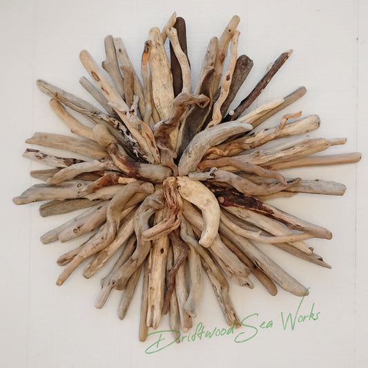 This unique and natural starburst measures 26 x 25 x 5 inches. I made it with driftwood I collected along the beaches of Oregon.
Each Driftwood sculpture is unique and hand made with hand selected driftwood pieces attached one piece at a time using nails for long lasting strength and durability not glue. I have also attached a saw tooth hook on the back for easy hanging as well.
