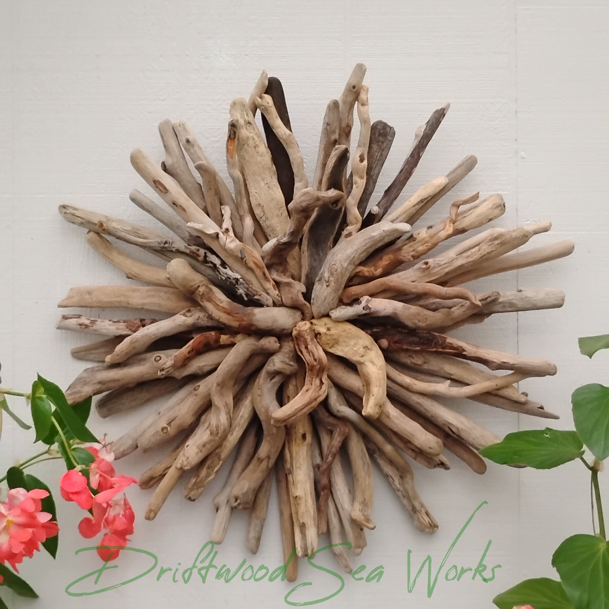 Add natural, coastal charm and elegance to your home with driftwood. This starburst was hand-crafted using real naturally weathered driftwood. The starburst design adds a touch of texture, dimension and asymmetry to your interior style. Bring the beauty of the beach indoors with this stunning wall hanging. Create a stunning dynamic focal point with visual interest.
