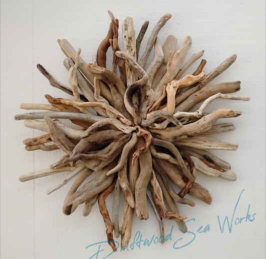 Driftwood Art sunburst beach home wall hanging. Natural, organic wood from the beaches of Oregon.