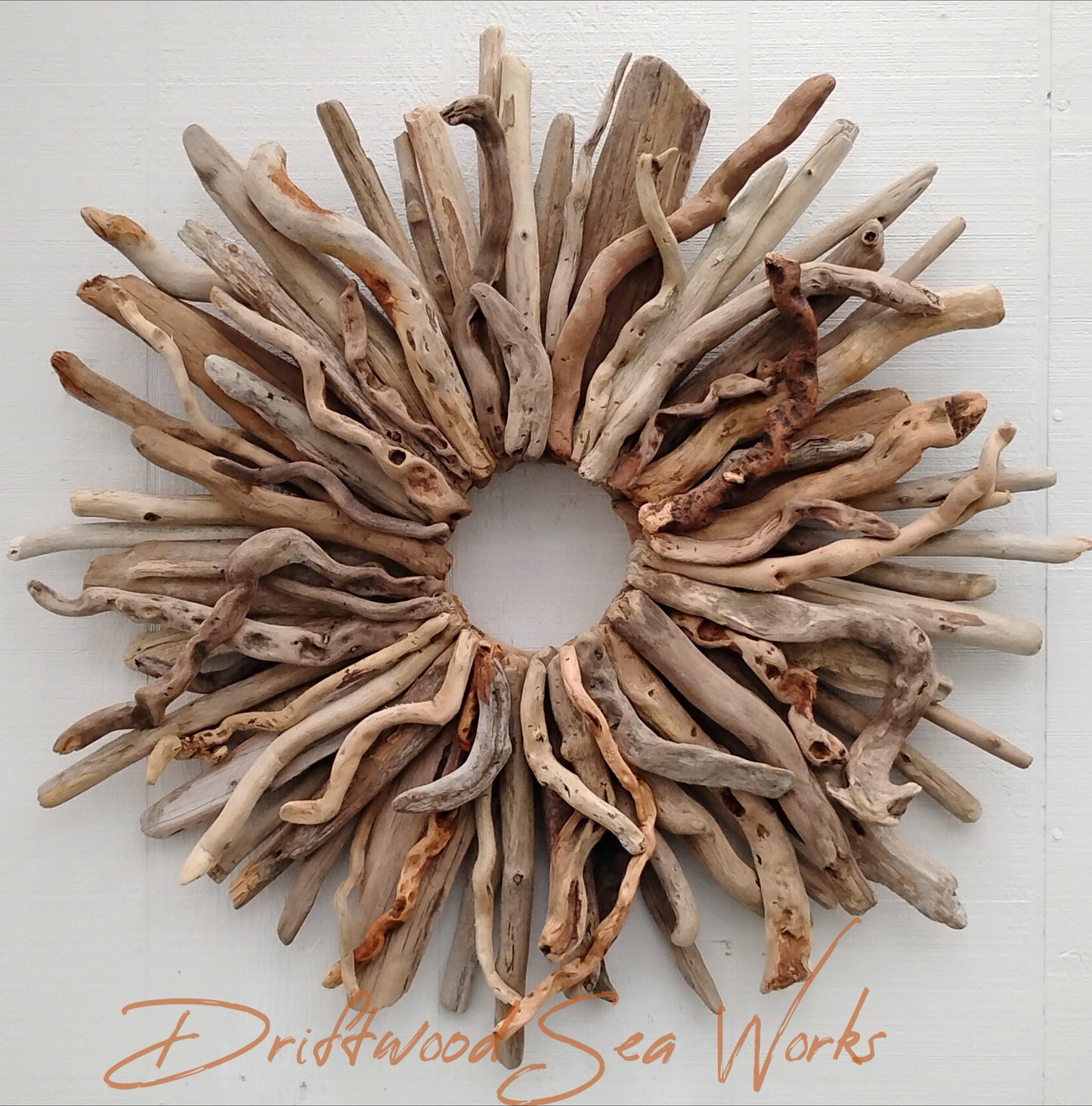 This Large driftwood wreath measures 28 x 28 inches and has a hanger on the back for easy hanging. Hand crafted with natural driftwood sticks that I collected along the Oregon Coastline. Each piece of driftwood has been washed to remove the salt and sand and allowed to dry naturally in the sun before use. Each piece is attached with nails for long lasting strength and durability. These one of a kind wreaths can be displayed indoors as well as outside if in an area protected from the elements like a covered 