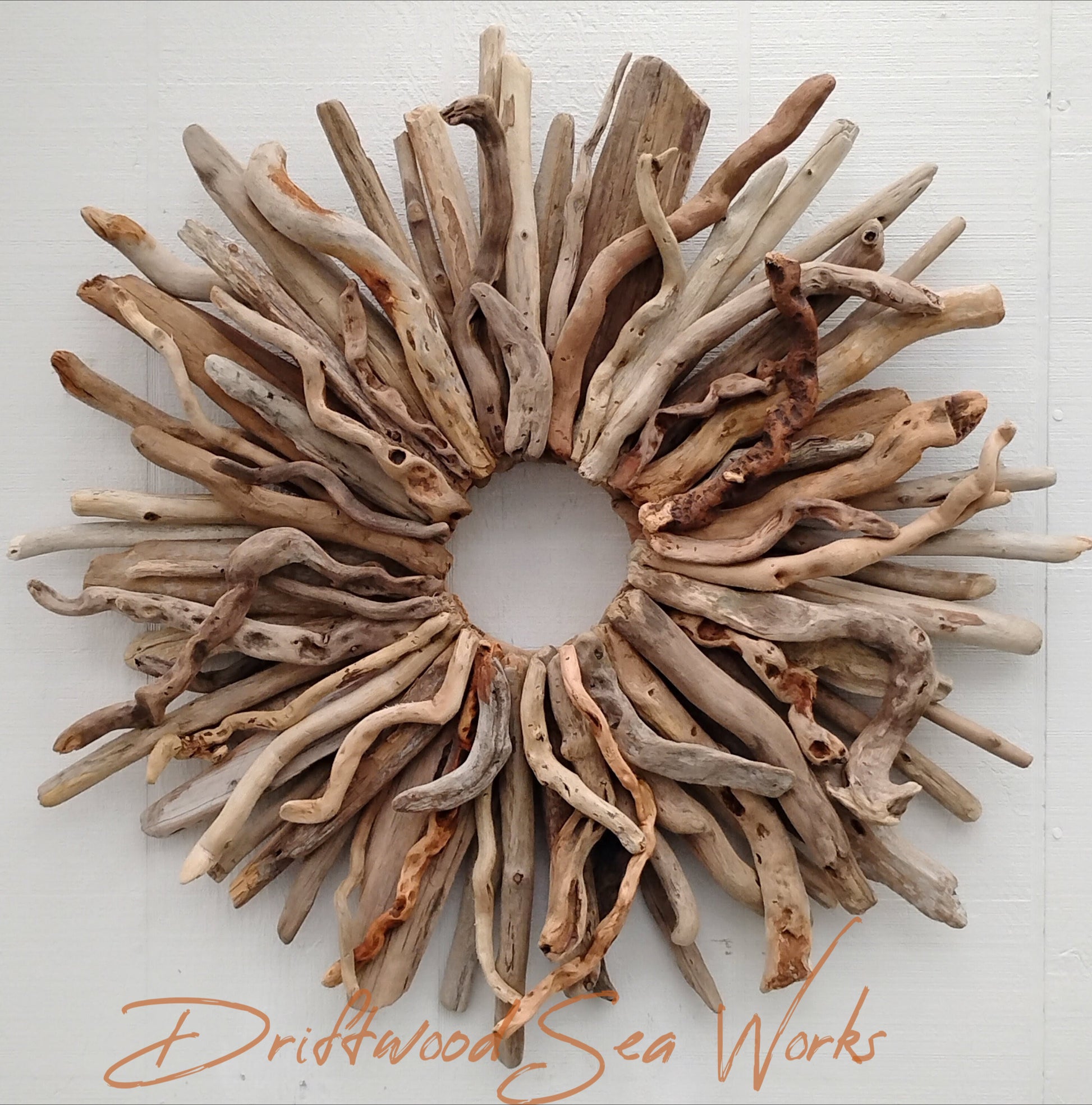 This Large driftwood wreath measures 28 x 28 inches and has a hanger on the back for easy hanging. Hand crafted with natural driftwood sticks that I collected along the Oregon Coastline. Each piece of driftwood has been washed to remove the salt and sand and allowed to dry naturally in the sun before use. Each piece is attached with nails for long lasting strength and durability. These one of a kind wreaths can be displayed indoors as well as outside if in an area protected from the elements like a covered 
