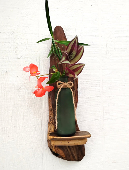 Rustic Driftwood Art flower vase with frosted green bottle that hangs on the wall