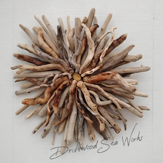 This unique and natural starburst measures 27 x 27 x 5 inches. I made it with driftwood I collected along the beaches of Oregon.
Each Driftwood sculpture is unique and hand made with hand selected driftwood pieces attached one piece at a time using nails for long lasting strength and durability not glue. I have also attached a saw tooth hook on the back for easy hanging as well.
