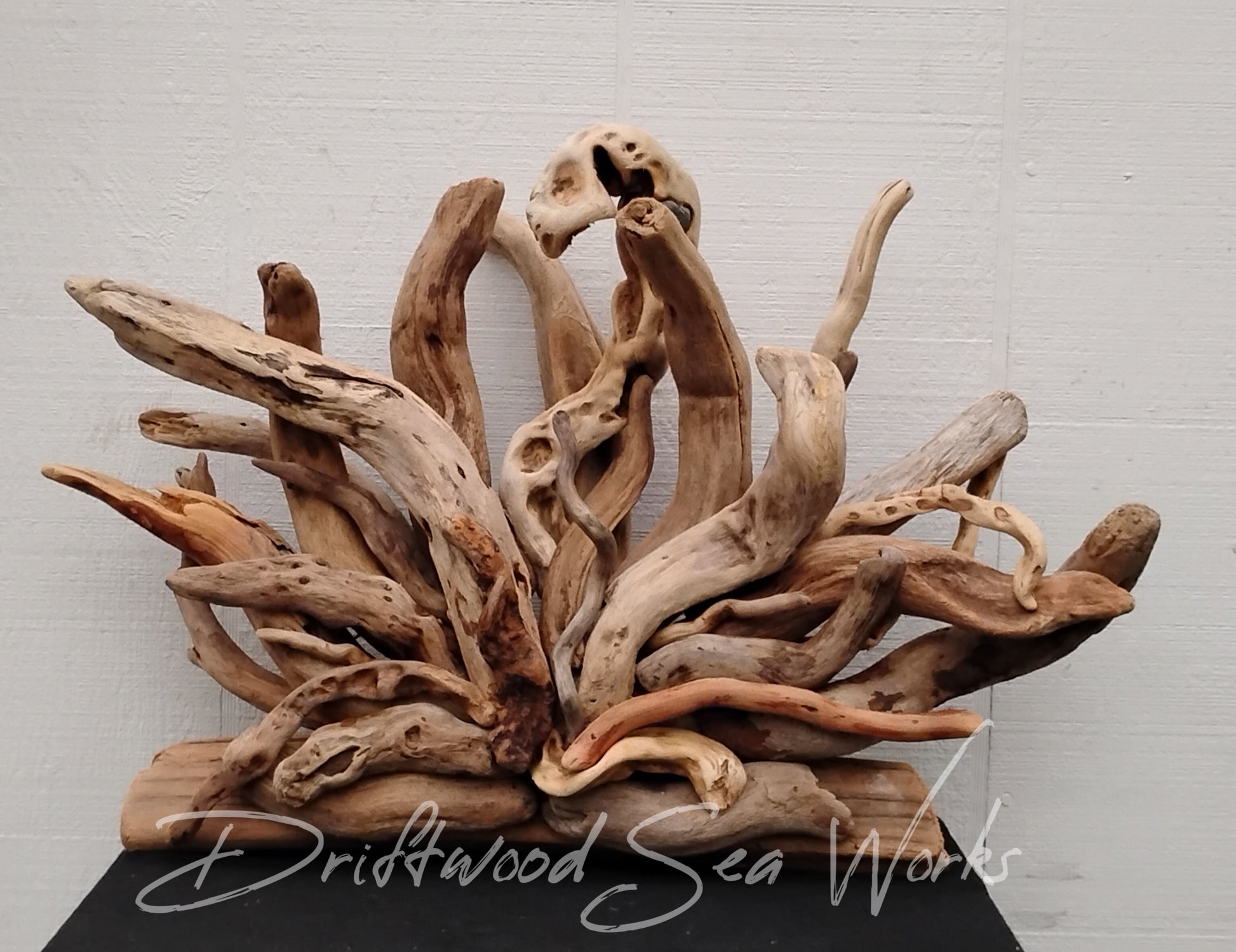 Made from real driftwood, each abstract sculpture is hand-crafted and one-of-a-kind. Its organic textures and earthy tones create a serene and natural atmosphere. Perfect for home decor or as a special gift.