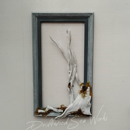 Gray fr as me with handmade white driftwood tree with no leaves