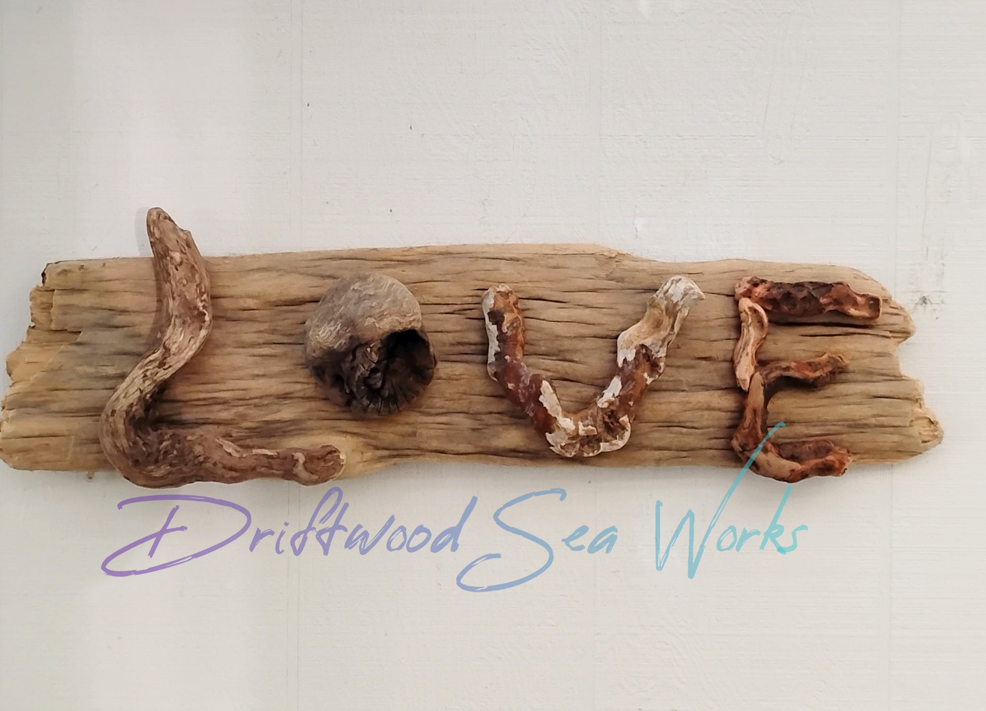 This natural driftwood LOVE sign measures 26 x 6 inches and was made by me with driftwood I collected on the beautiful Oregon Coastline. I used one natural, untreated piece of driftwood for the back. Next I selected the letters to form the word, LOVE. The entire piece is put together with nails, not glue for long lasting strength and durability. This sign is completely natural. There is no finish of any kind on it.  