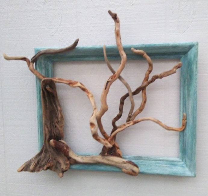 Leafless Tree Handmade With Driftwood In A Wooden Sea Blue