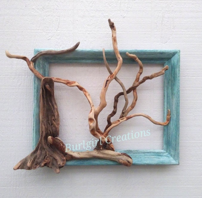 Leafless Tree Handmade With Driftwood In A Wooden Sea Blue